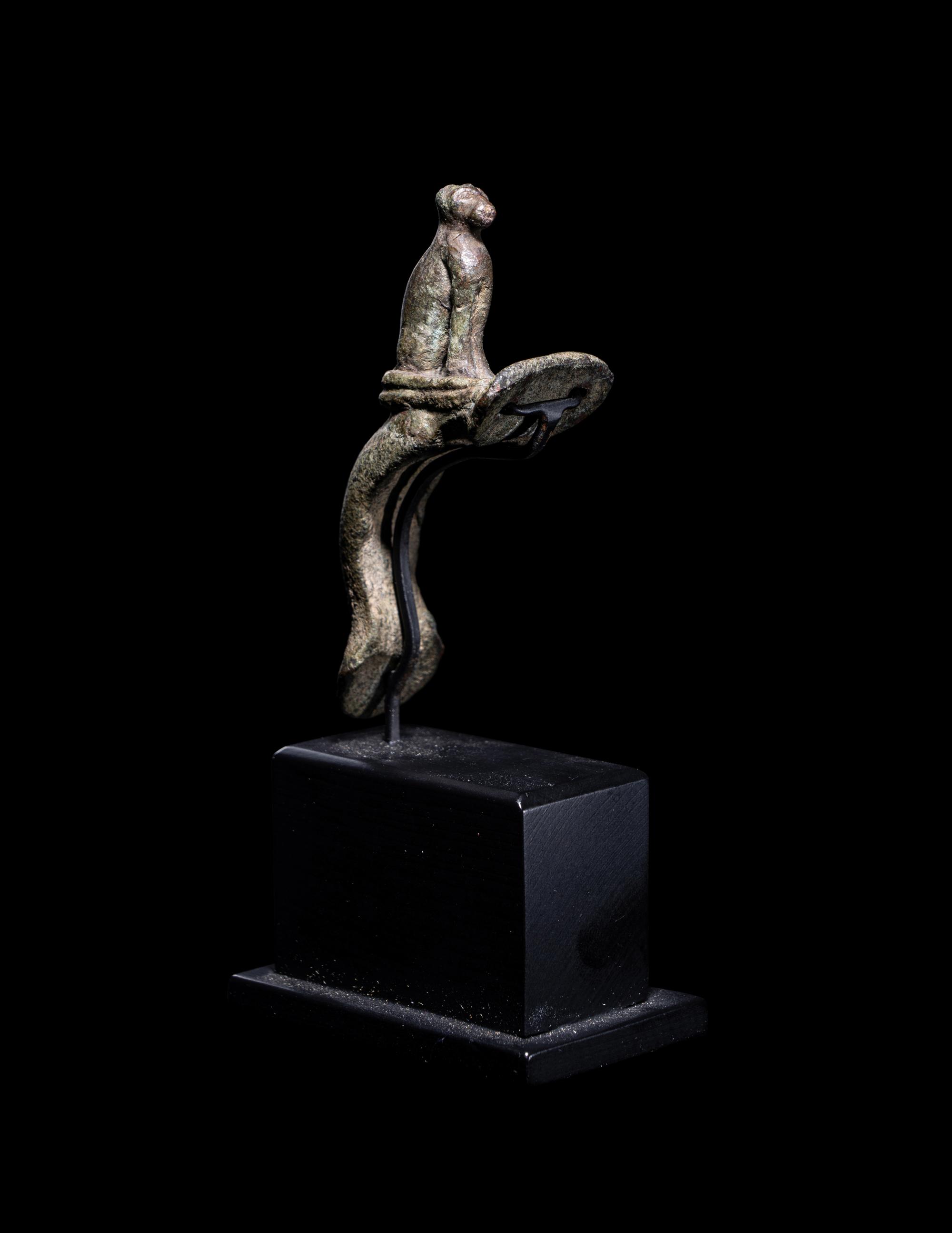 A Roman Bronze Handle with a Seated Cat
