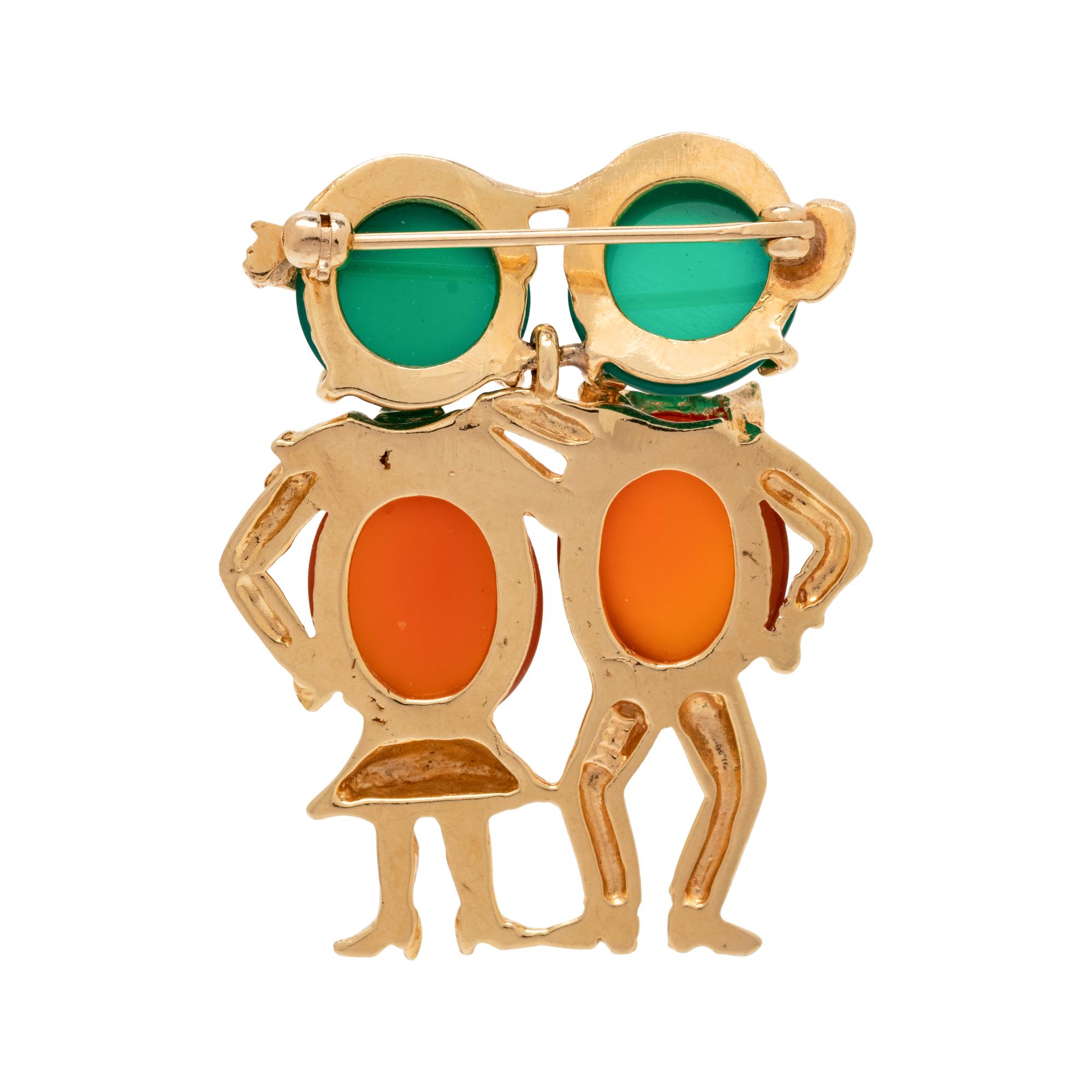 YELLOW GOLD AND GEMSTONE FIGURE BROOCH