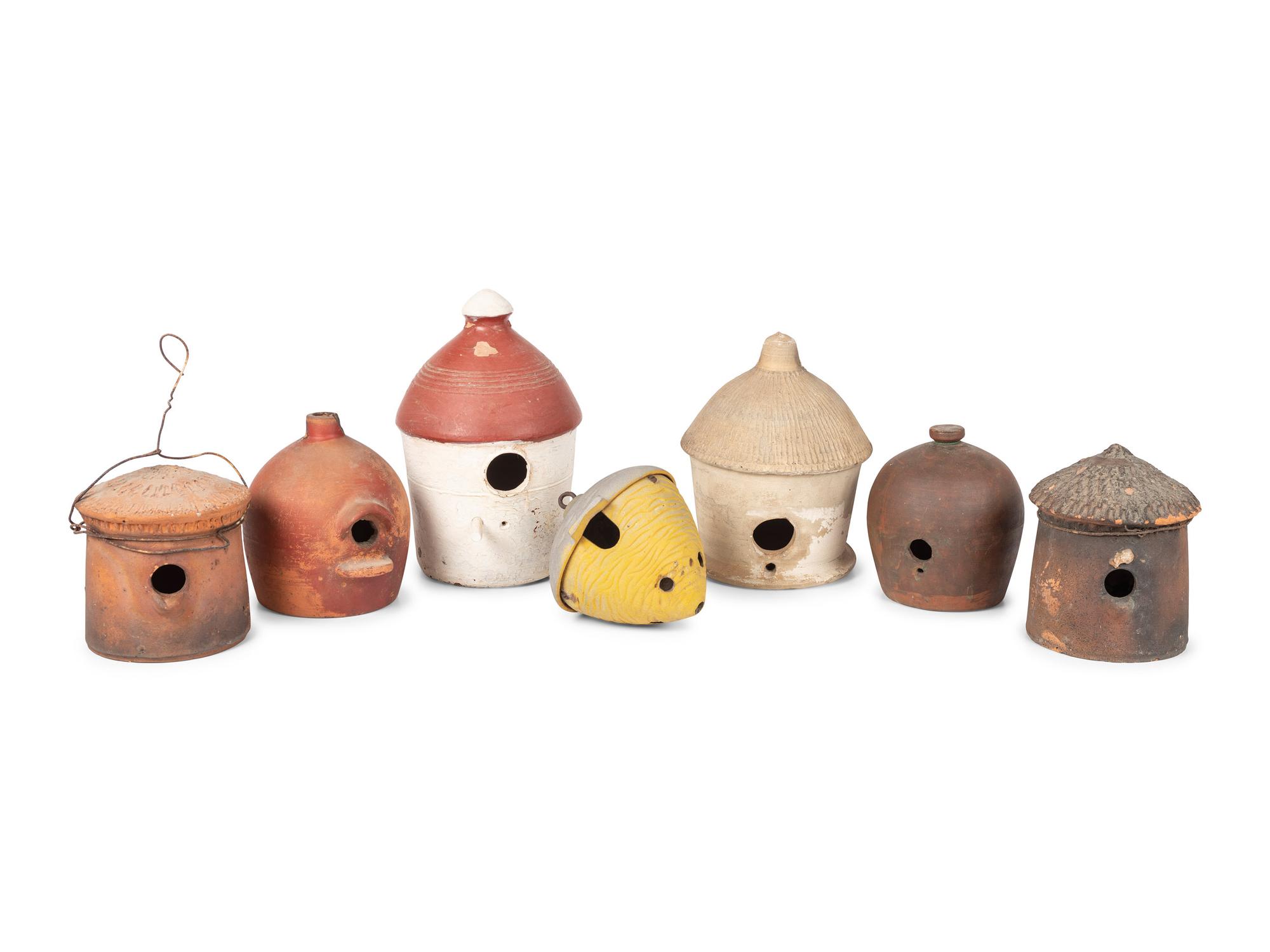 Seven Redware and Stoneware Birdhouses