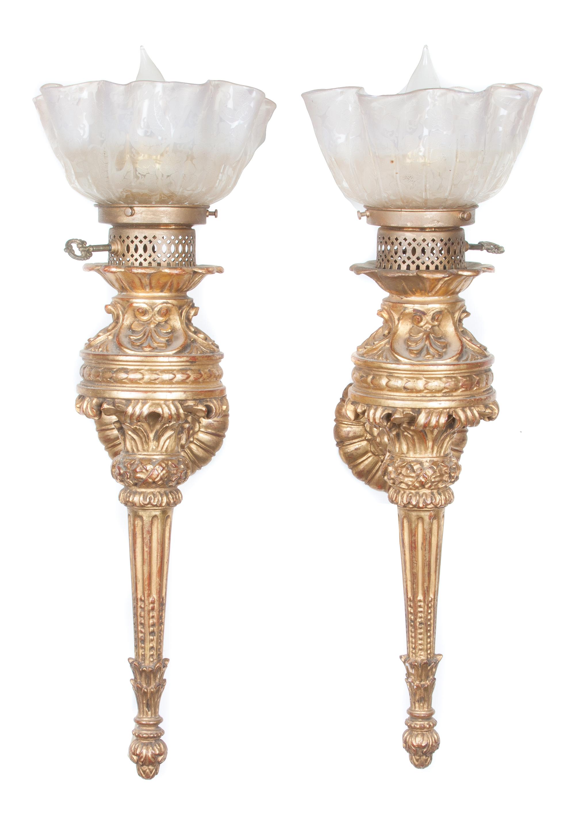 A Pair of Giltwood Sconces Height overall 31 inches.