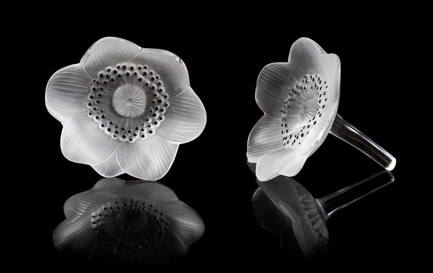 Lalique, a pair of molded and frosted glass Anemone figural paperweights