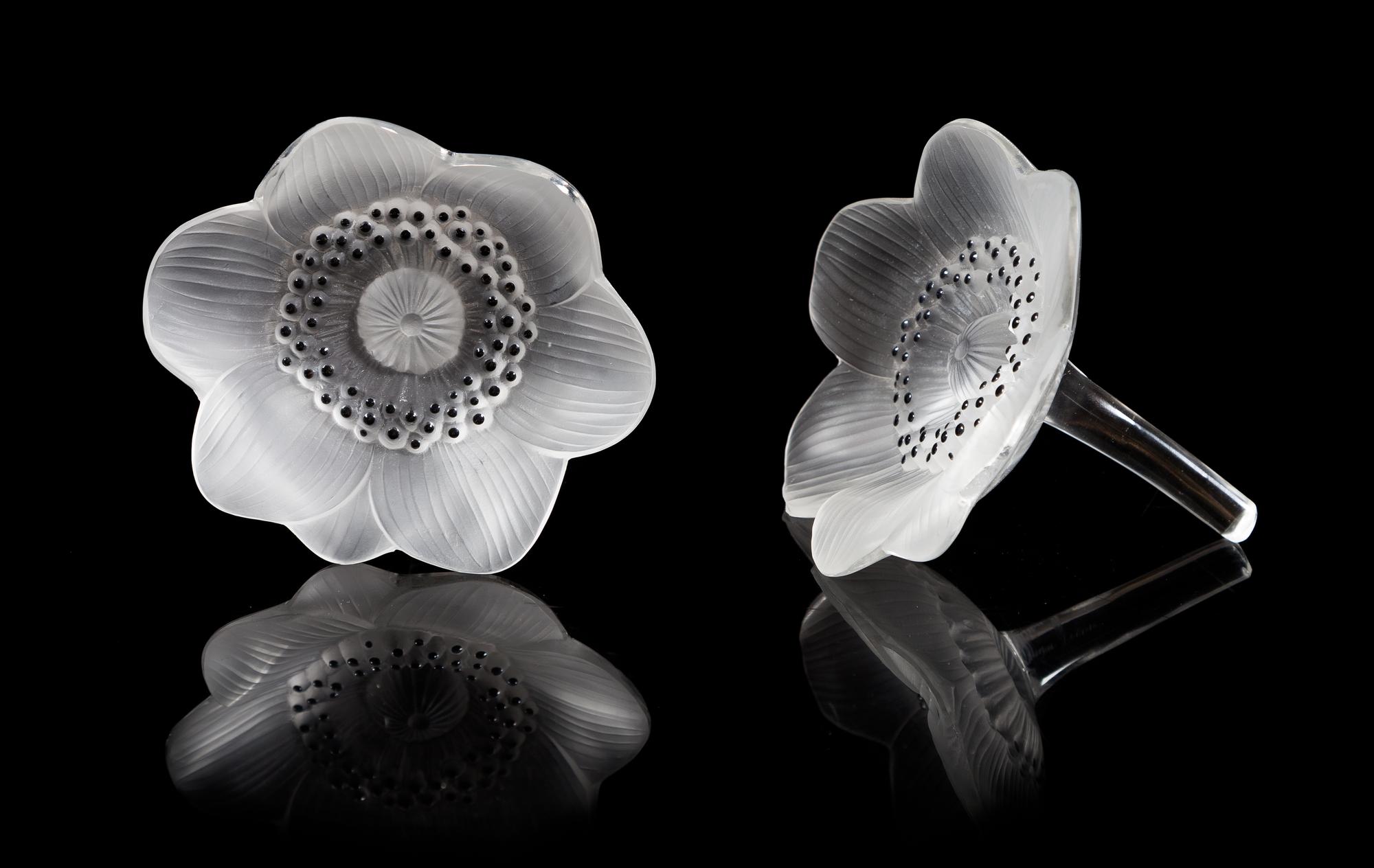 Lalique, a pair of molded and frosted glass Anemone figural paperweights