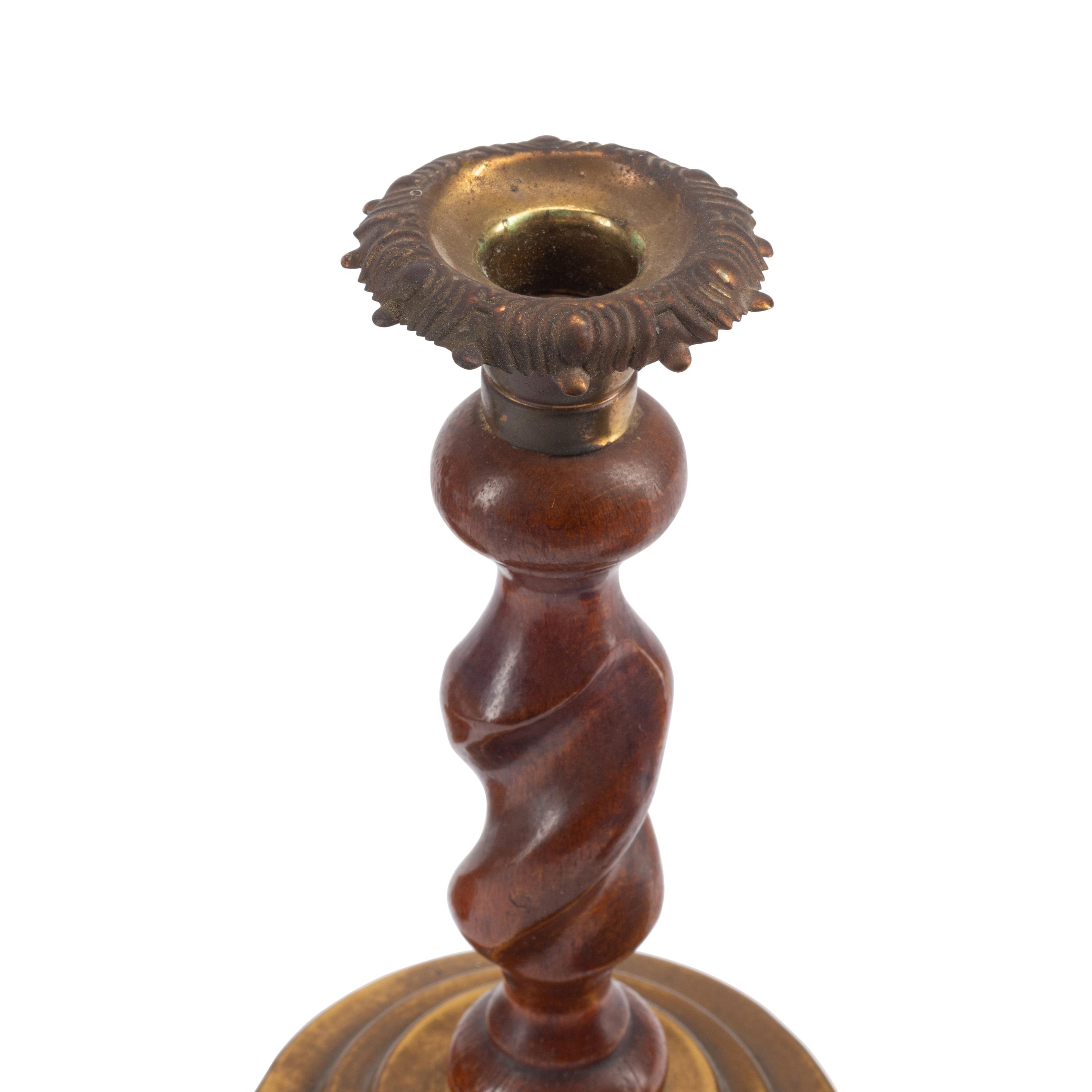 A Group of Seven Turned Wood Candlesticks