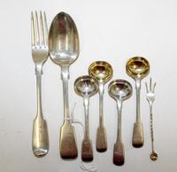 A Collection of English Silver Flatware, various makers, comprising a pair of George IV condiment spoons marked William Traies, London,