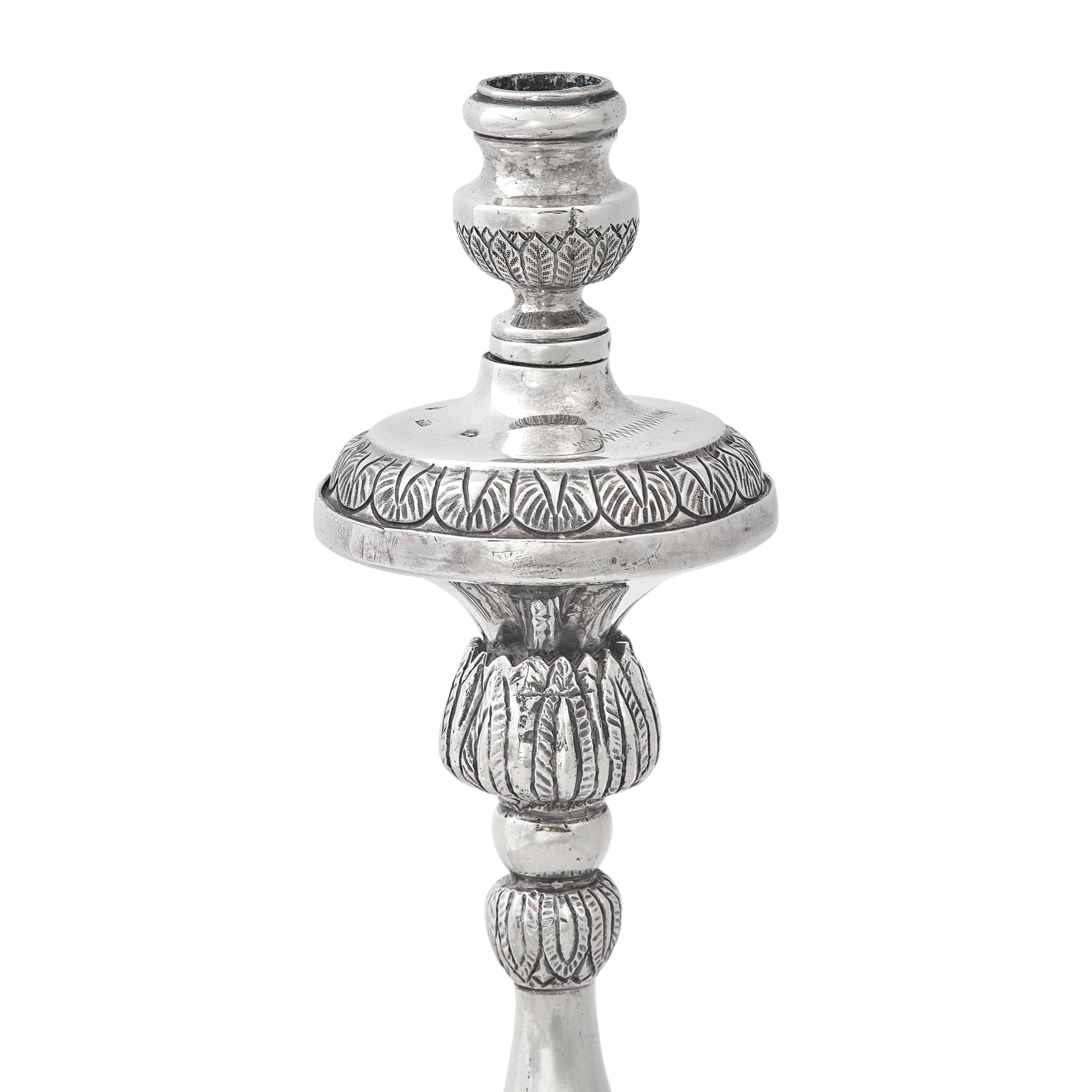 A Set of Four Mexican Silver Candlesticks
