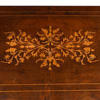 A Pair of Charles X Mahogany and Marquetry Commodes