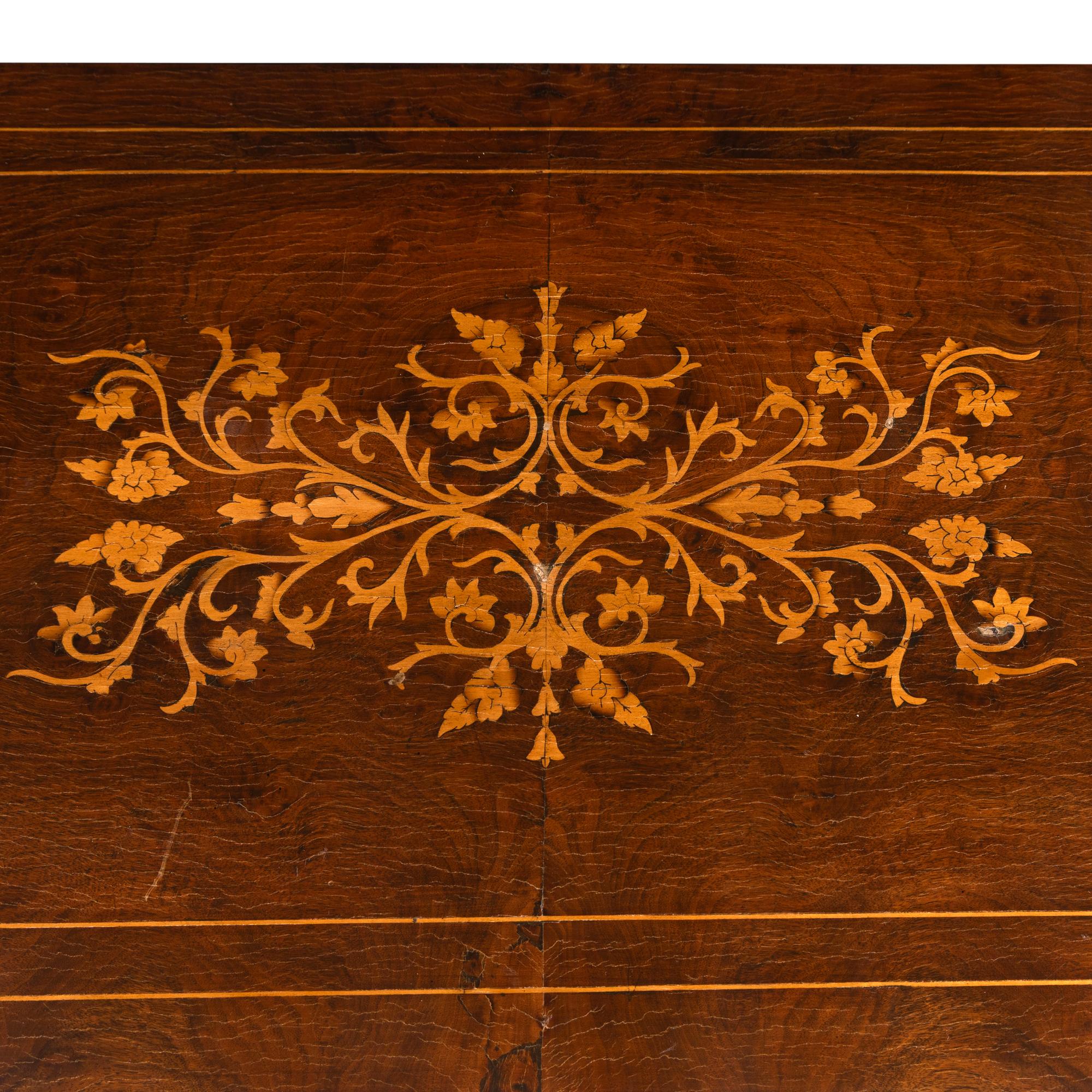 A Pair of Charles X Mahogany and Marquetry Commodes