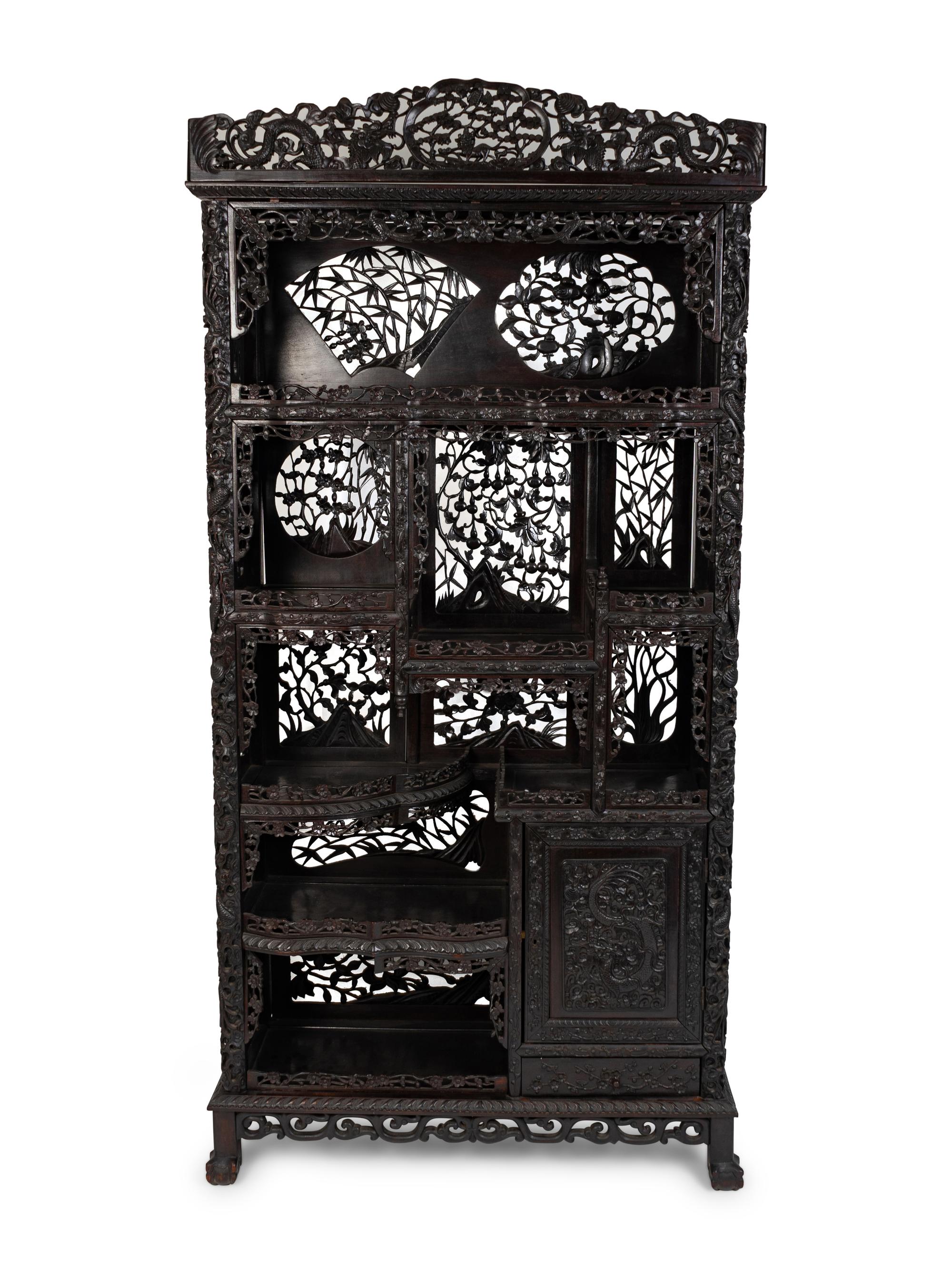 A Chinese Carved Hardwood Etagere — 20TH CENTURY
