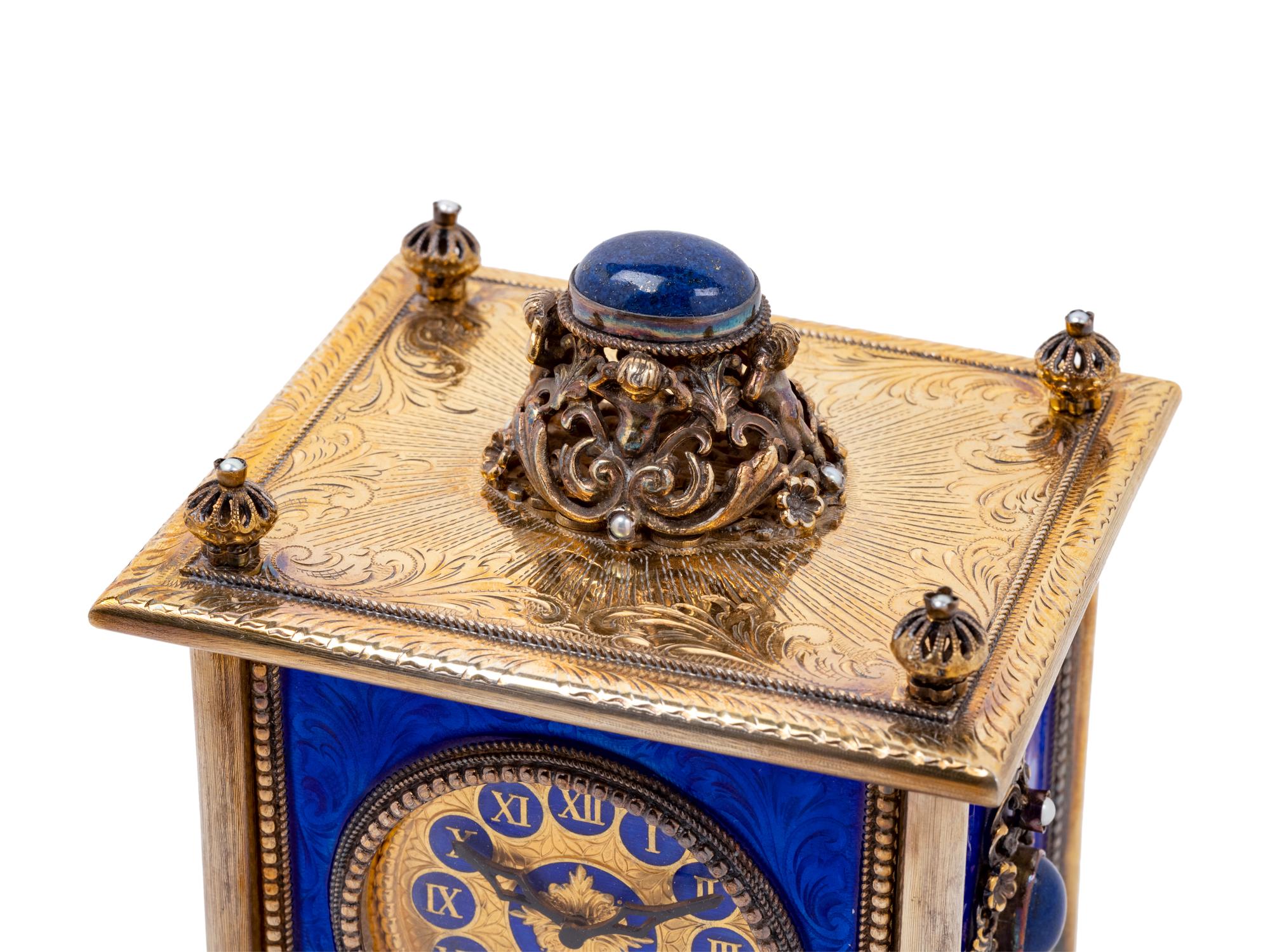 A Continental Blue Hardstone and Cultured Pearl Inset Gilt Metal and Enameled Table Clock