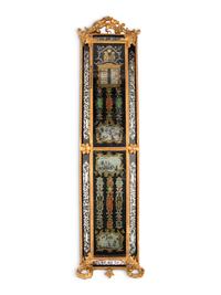 A German Rococo Carved Giltwood and Églomisé Decorated Barometer