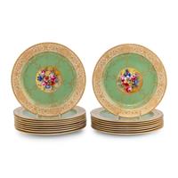 A Set of Seventeen Royal Worcester Painted Porcelain Dessert Plates