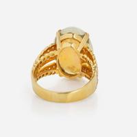 An 18K Yellow Gold, Diamond, and Opal Ring