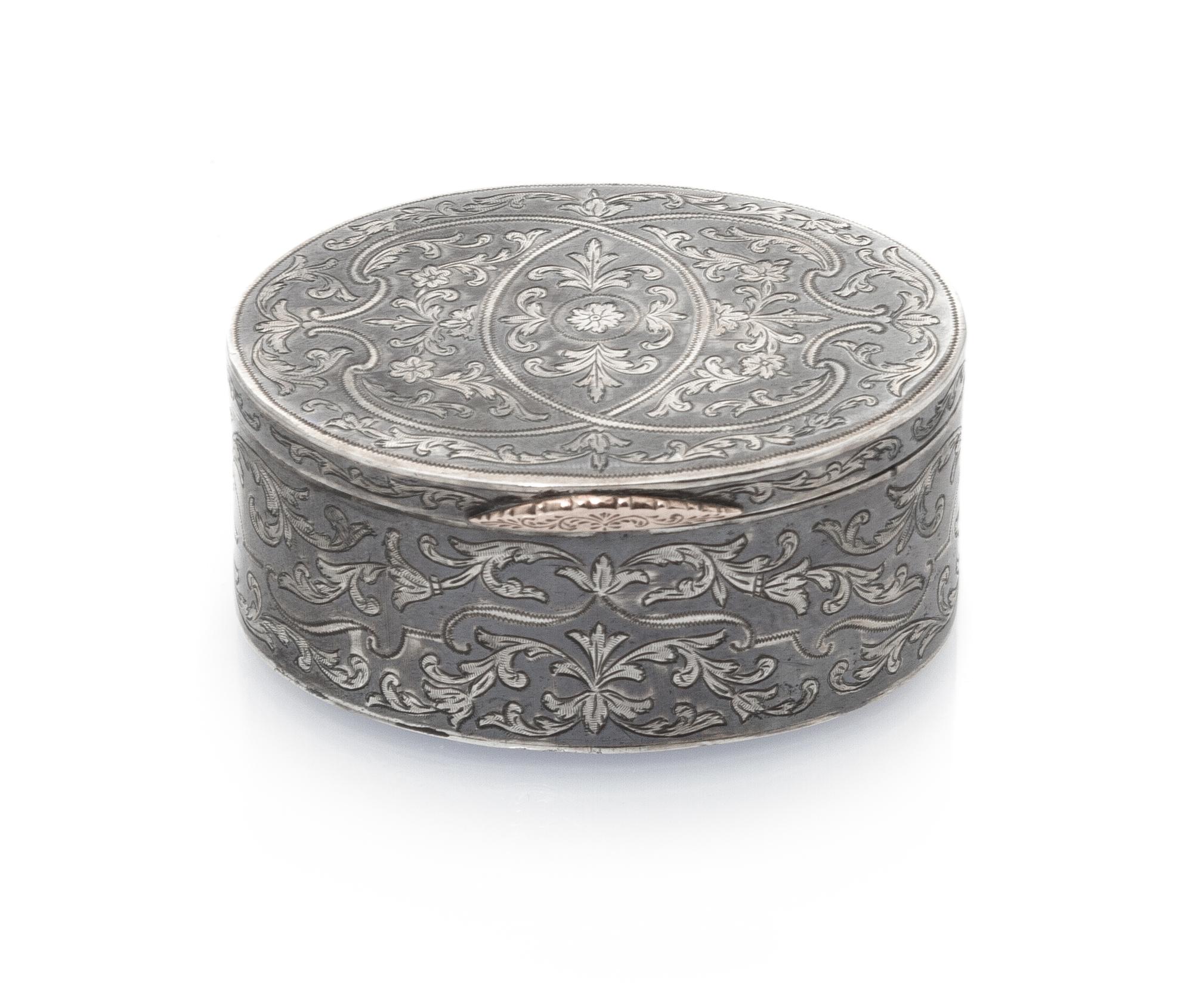 A Russian Niello Silver Box, Maker's mark Cyrillic P.S, assay obscured, Moscow, 19th Century, the case worked with engraved floral and