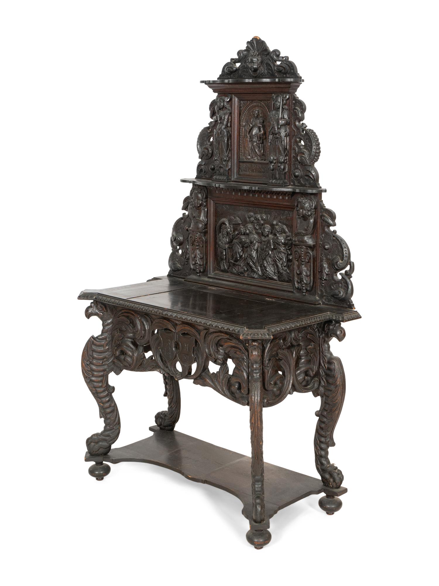 A Renaissance Revival Elaborately Carved Oak Stand