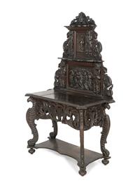 A Renaissance Revival Elaborately Carved Oak Stand