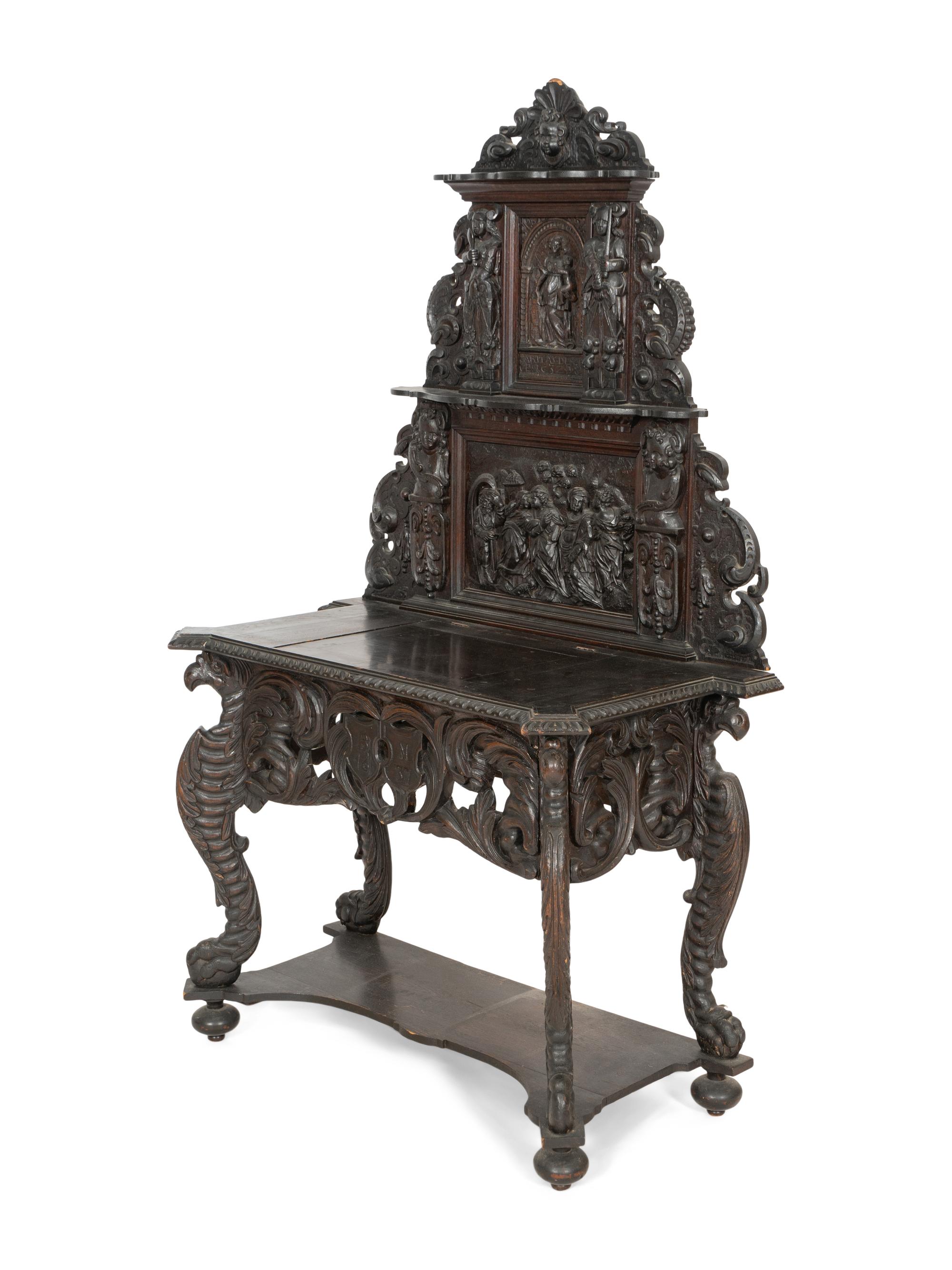 A Renaissance Revival Elaborately Carved Oak Stand