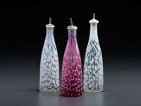 Three Coral Opalescent Glass Barber Bottles