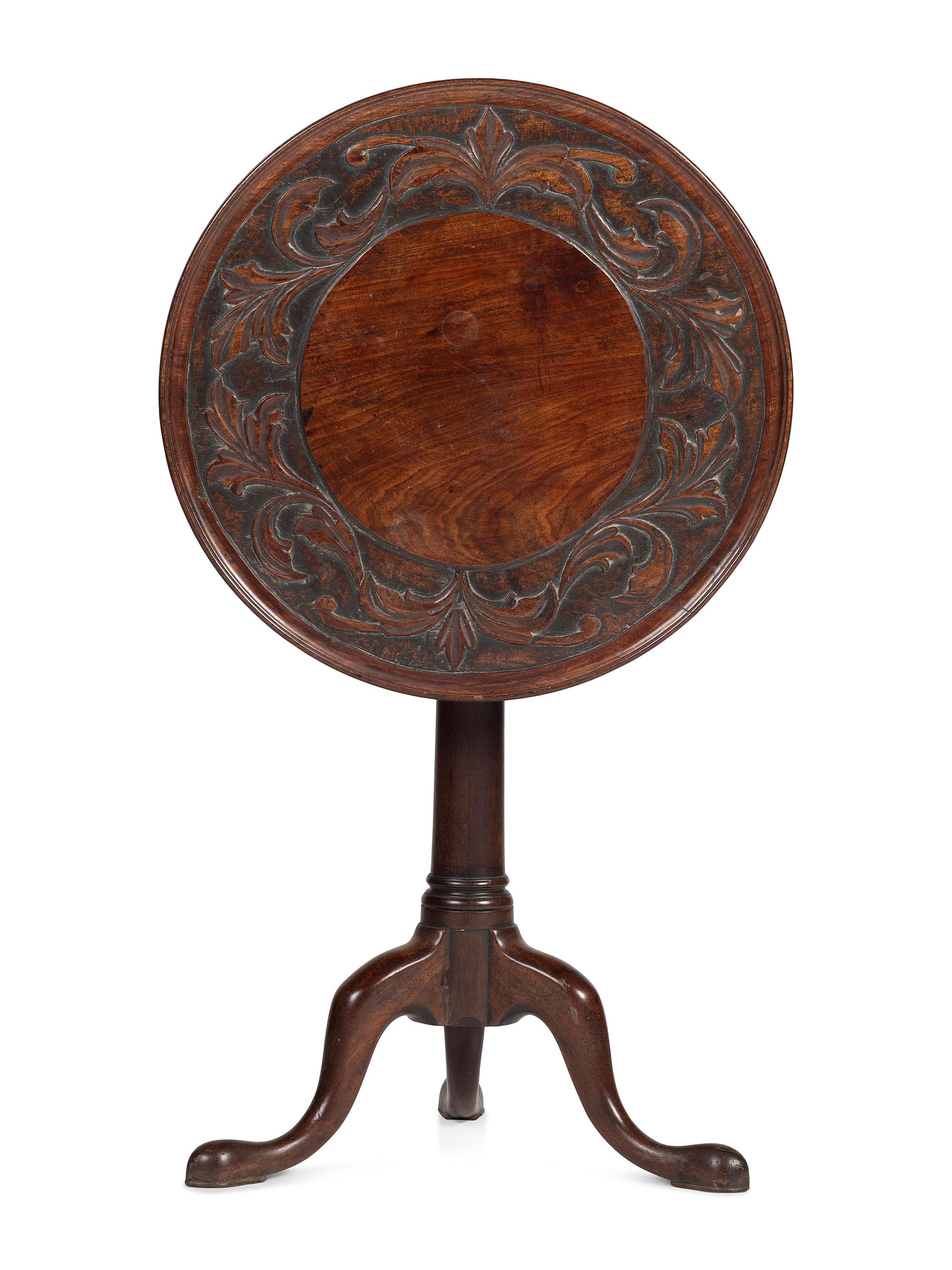 A Carved Walnut Dished-Top Tea Table