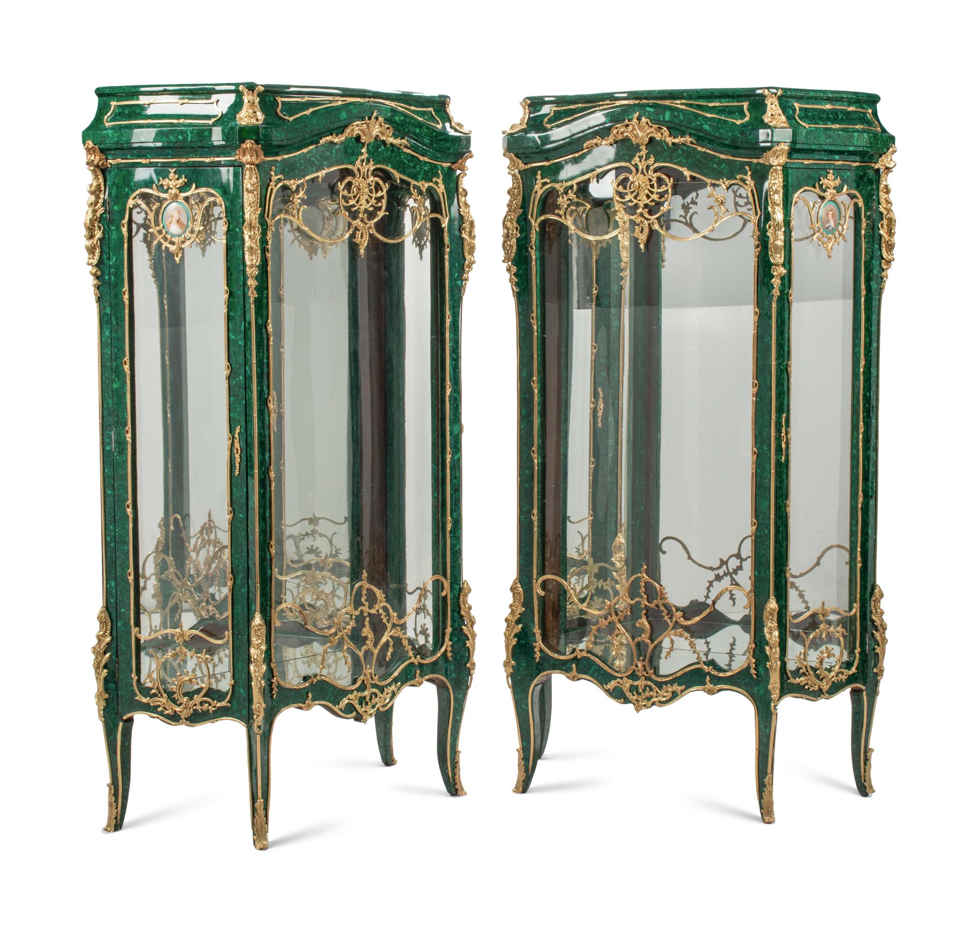 A Pair of Louis XV Style Gilt Bronze and Porcelain Mounted Malachite Cabinets