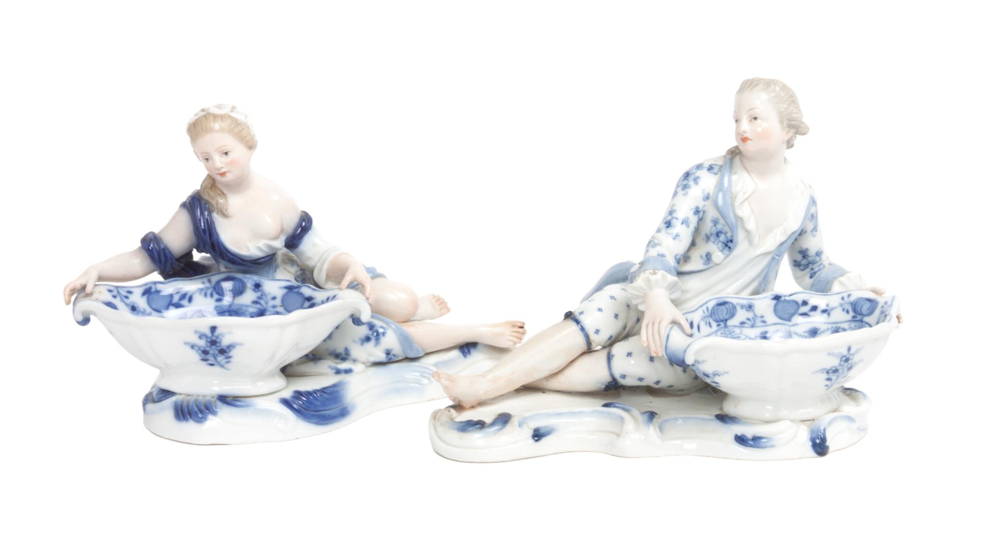 A Pair of Meissen Porcelain Figural Salts Height 4 3/4 x width 7 1/4 inches.