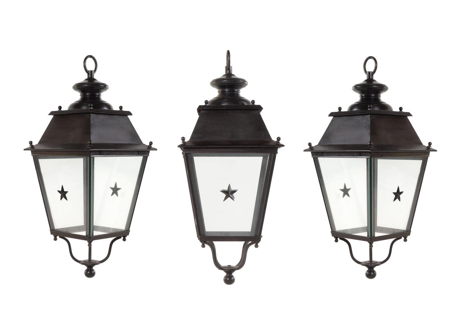 A Set of Three Painted Metal Lanterns