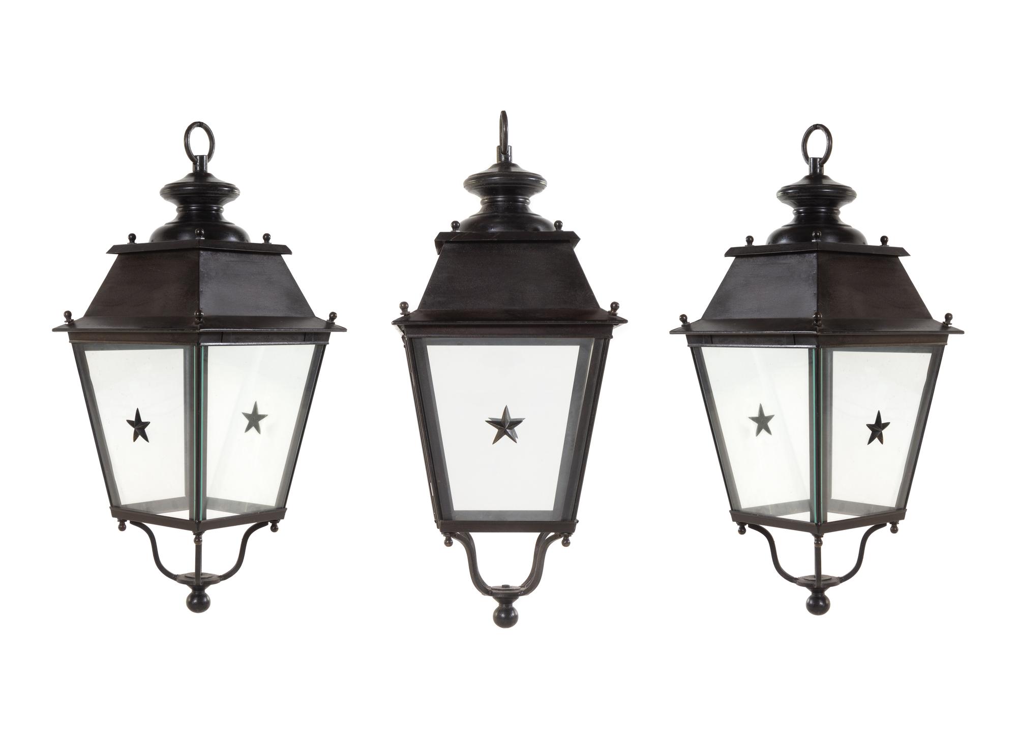 A Set of Three Painted Metal Lanterns