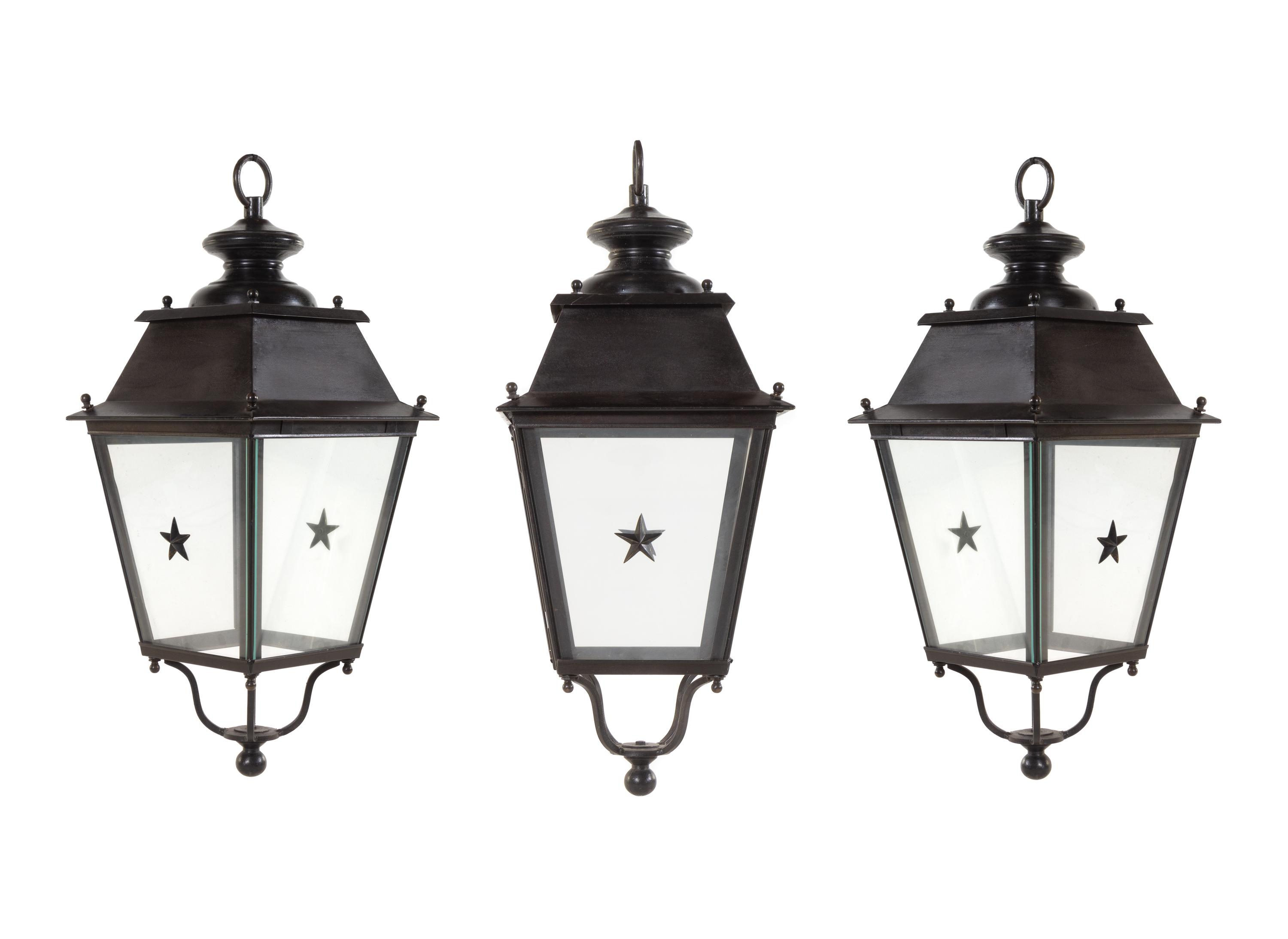 A Set of Three Painted Metal Lanterns