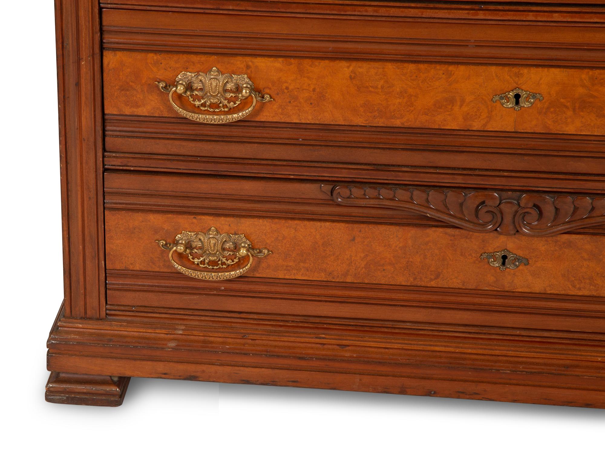 A Victorian Burl Inlaid Mahogany Chest of Drawers