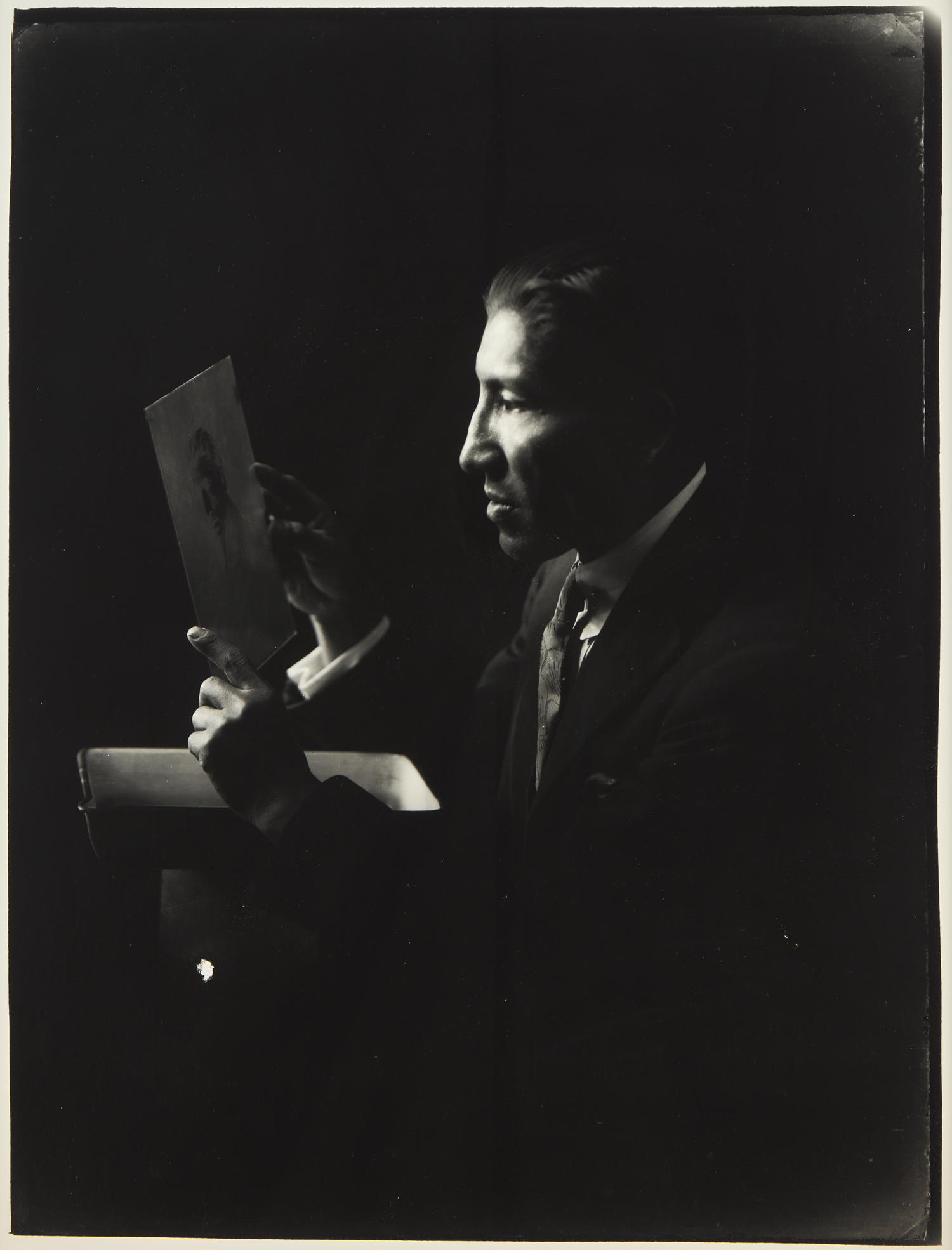 A Group of Three Photographs