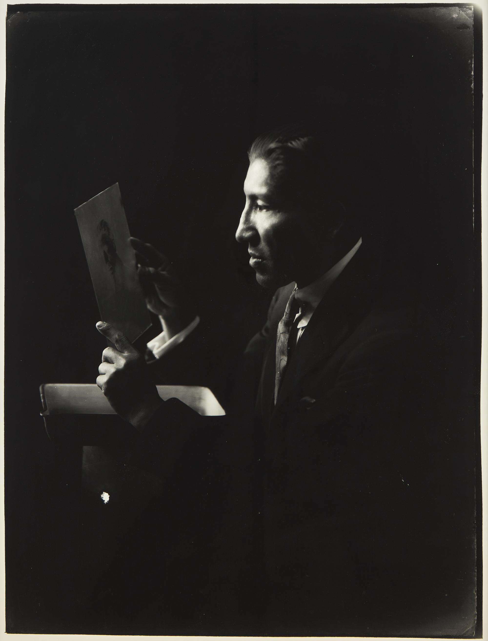 A Group of Three Photographs