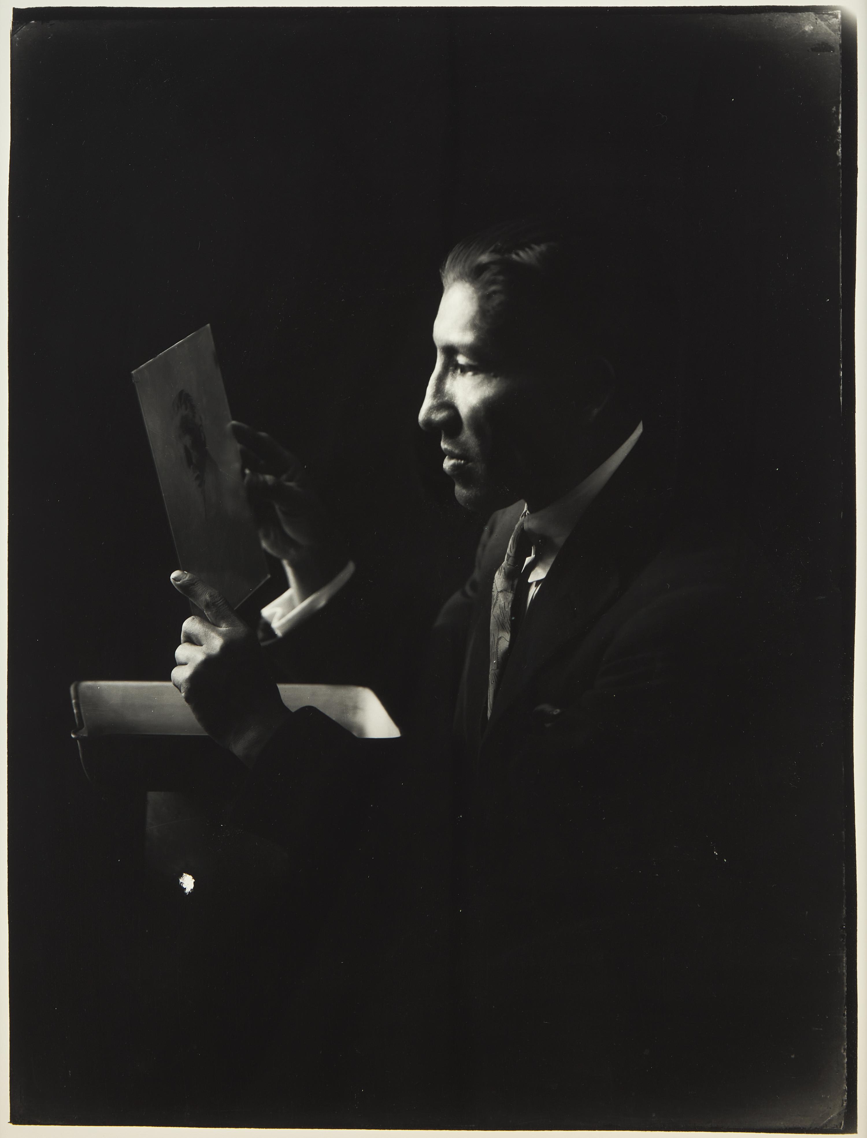 A Group of Three Photographs