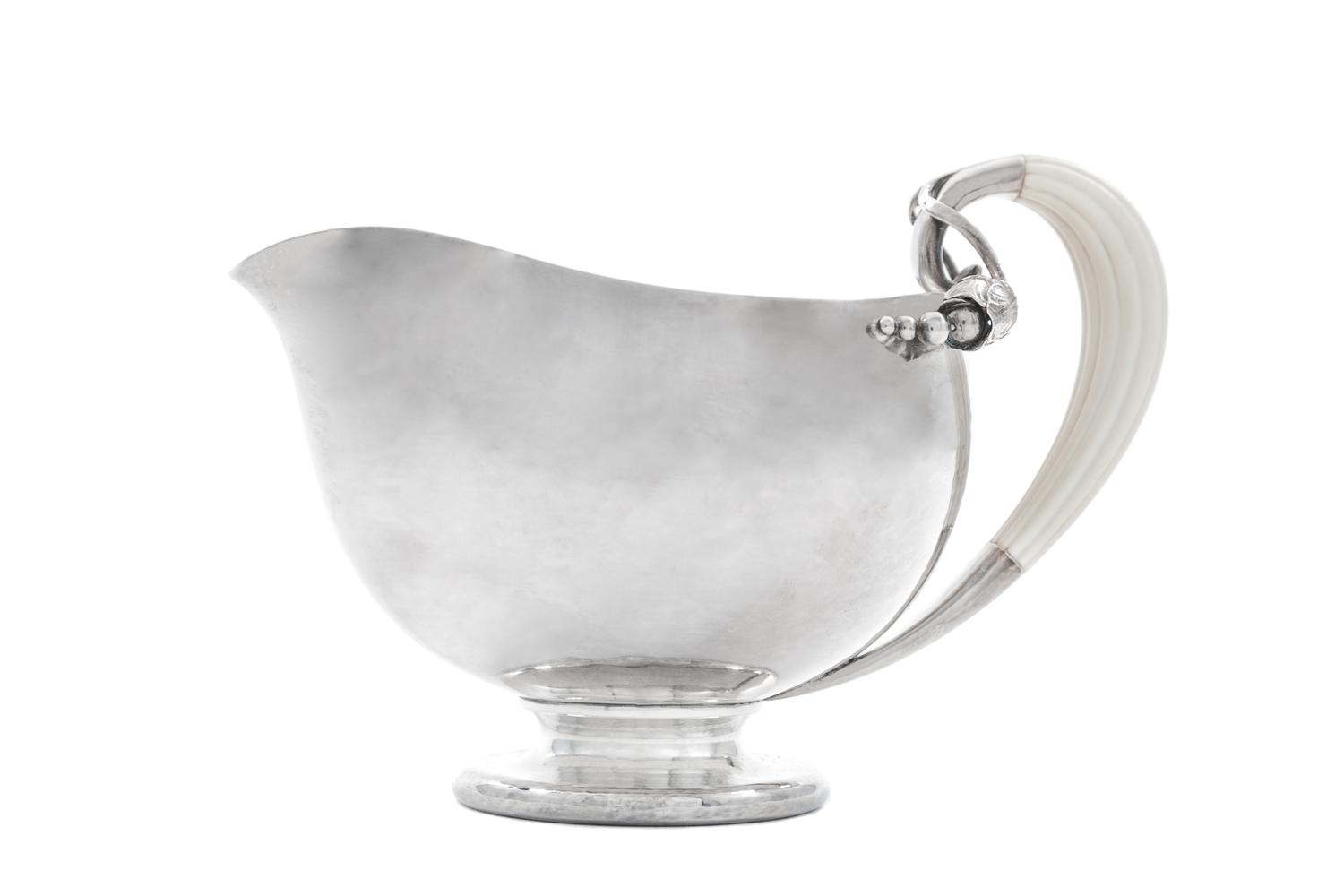 A Danish Silver Sauce Boat, Georg Jensen Silversmithy , Copenhagen, Second Half 20th Century, Blossom pattern.