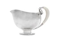 A Danish Silver Sauce Boat, Georg Jensen Silversmithy , Copenhagen, Second Half 20th Century, Blossom pattern.
