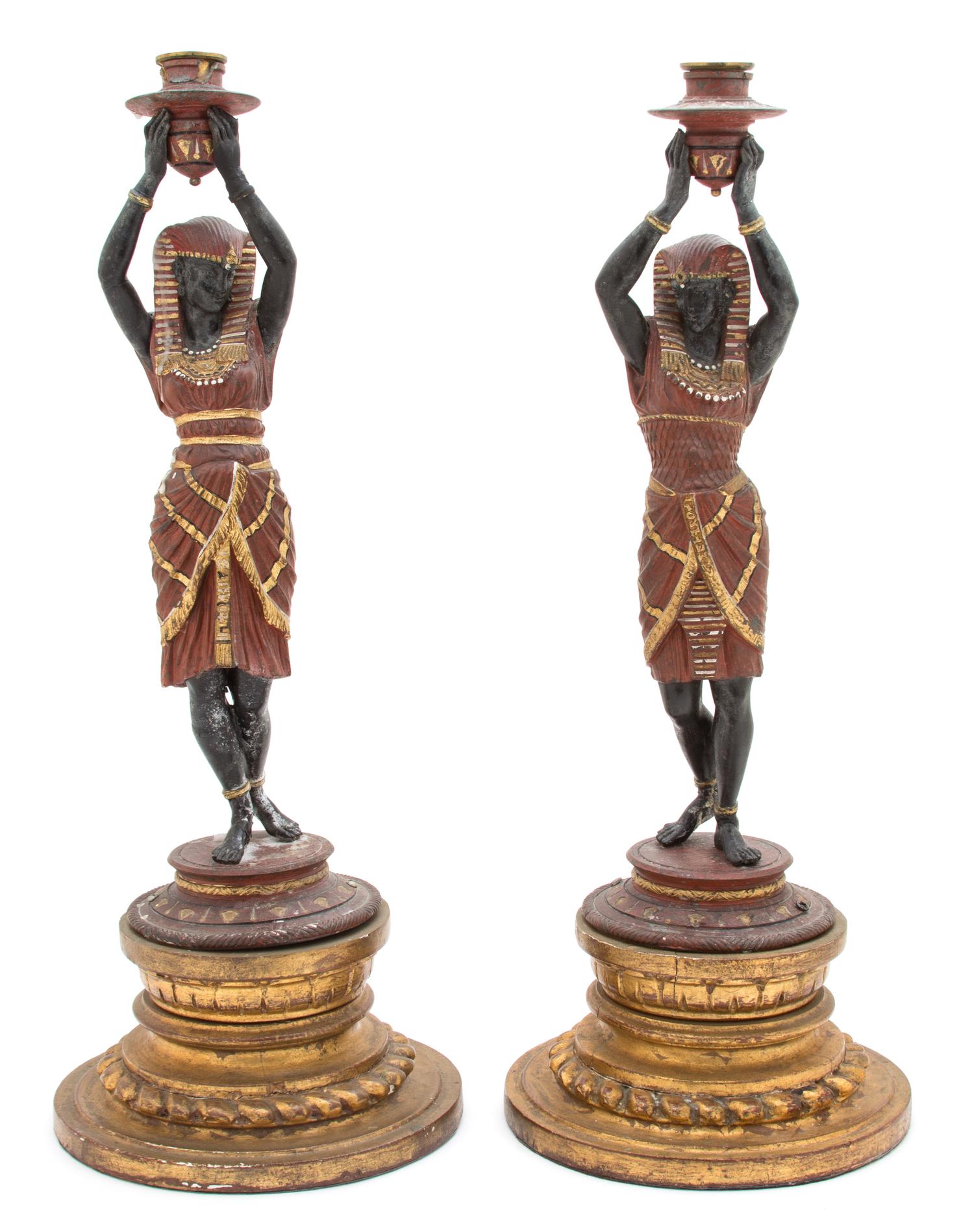 A Pair of Continental Painted Metal Figural Candlesticks Height 19 1/2 inches. — LATE 19TH CENTURY