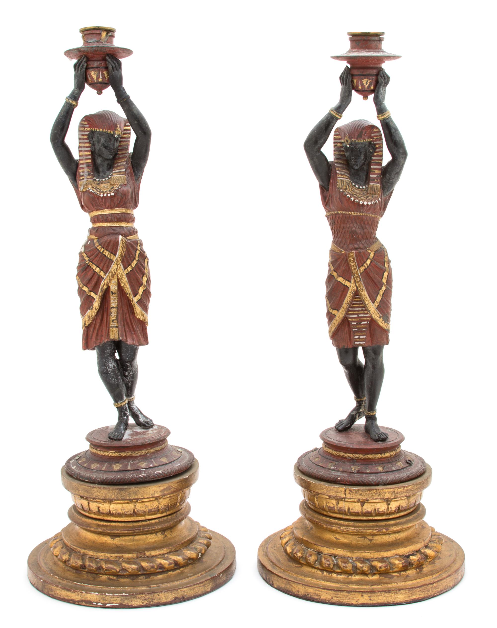 A Pair of Continental Painted Metal Figural Candlesticks Height 19 1/2 inches. — LATE 19TH CENTURY