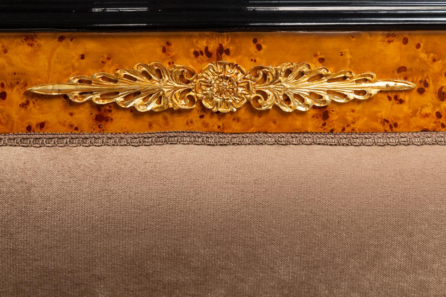 A Pair of Directoire Style Parcel Ebonized Burlwood Settees