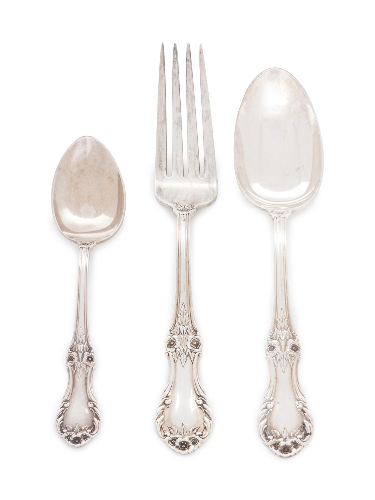 in the Wild Rose pattern, comprising: 3 butter spreaders 2 dinner forks 4 luncheon forks 3 salad forks 3 tablespoons 6 teaspoons 2 cream soup spoons 2 iced tea spoons 25 pieces total.