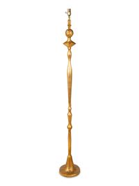 A Gilt Lead Floor Lamp — CIRCA 1930