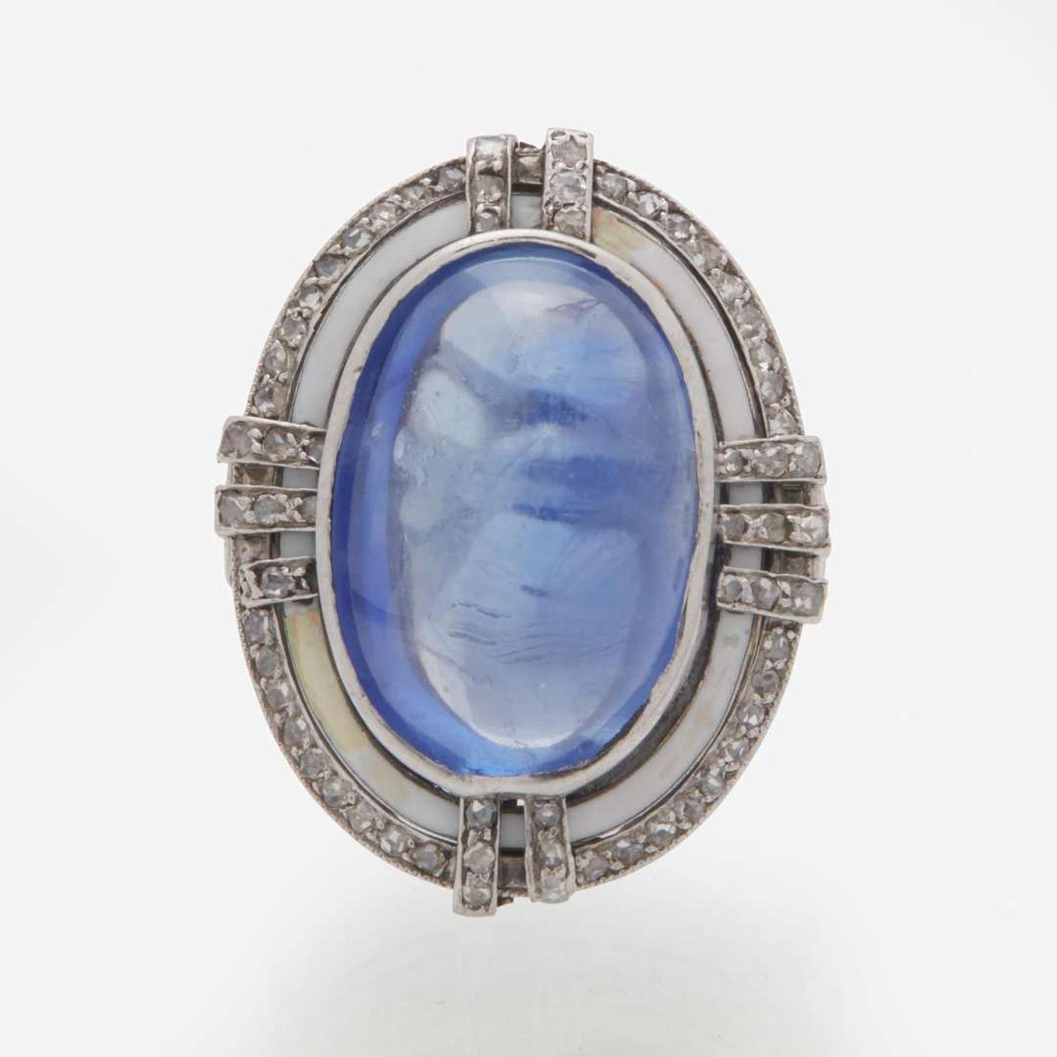 A 14K White Gold, Sugarloaf Sapphire, and Diamond Ring