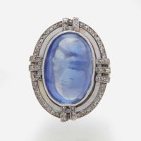 A 14K White Gold, Sugarloaf Sapphire, and Diamond Ring