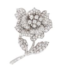 A Platinum and Diamond Flower Brooch, 21.00 dwts.