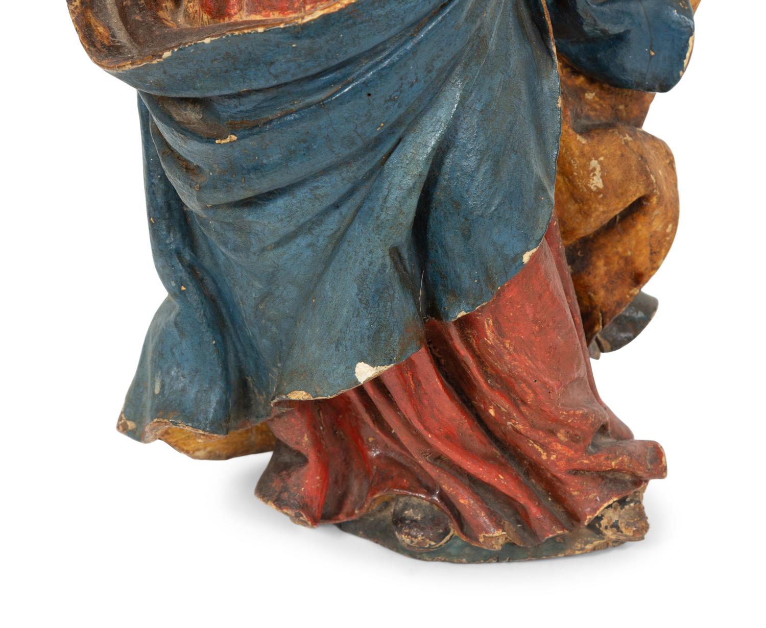 Two Italian Polychromed and Gilt Santos Figures
