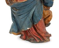 Two Italian Polychromed and Gilt Santos Figures