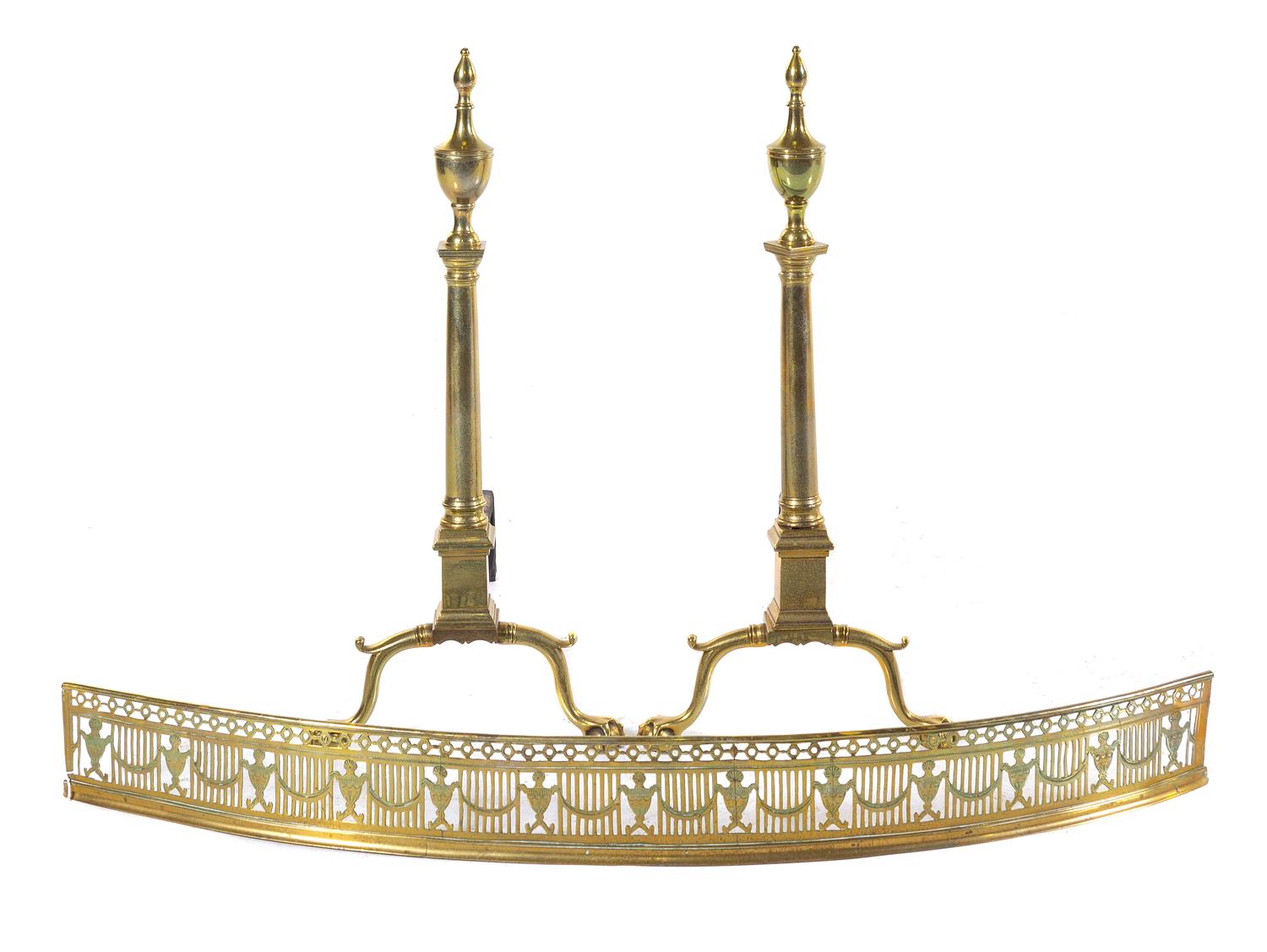 A Pair of Colonial Style Brass Andirons and an Associated Brass Fender Height of andirons 29 1/2 inches. — 18TH/19TH CENTURY