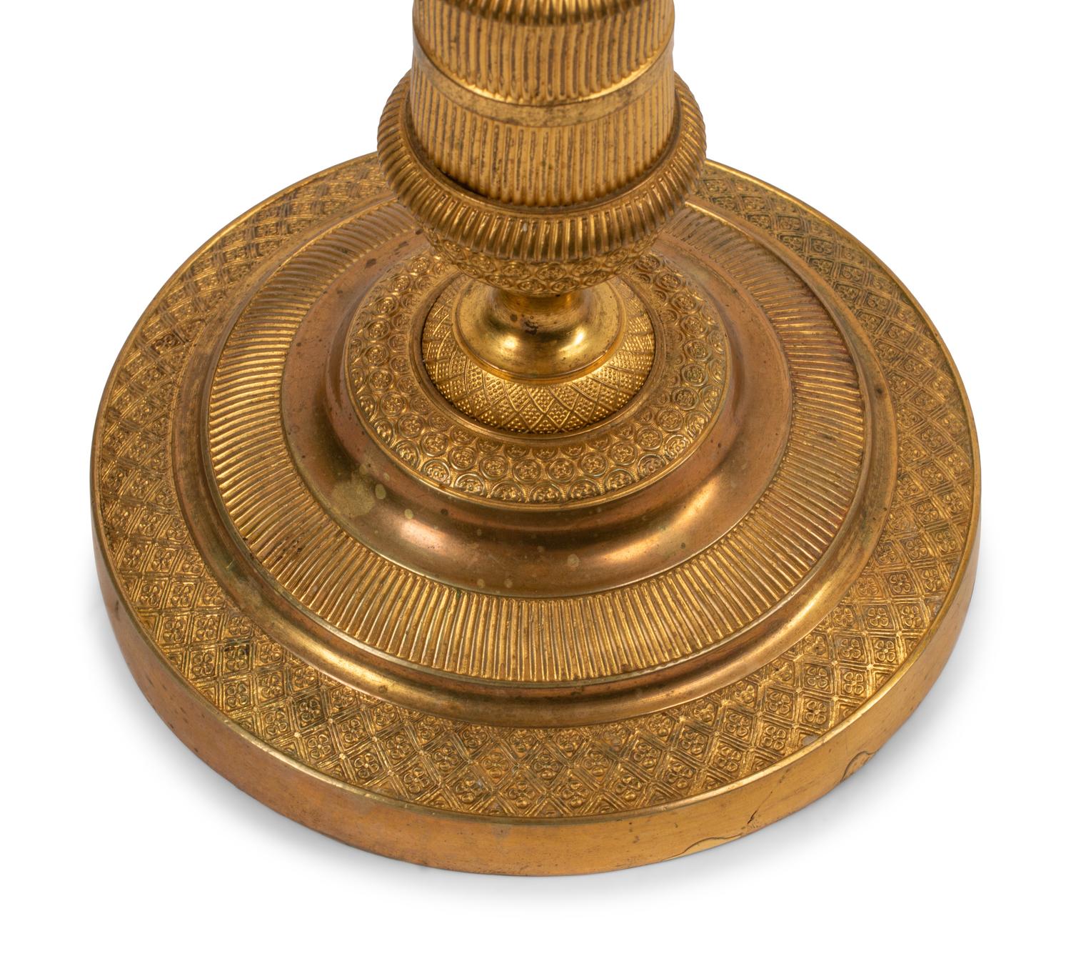 A Pair of Empire Style Gilt and Patinated Bronze Four-Light Candelabra