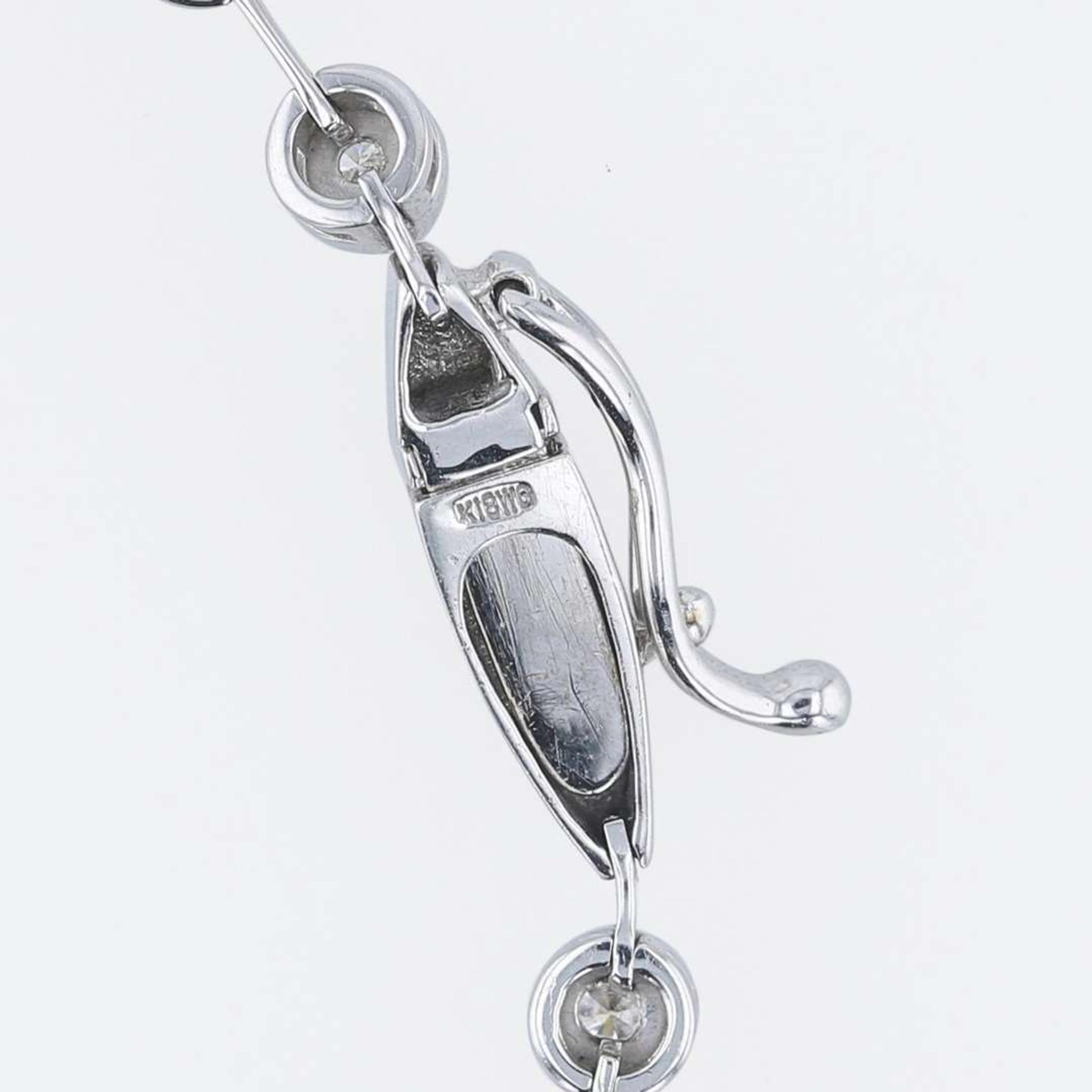 An 18K white gold and diamond necklace