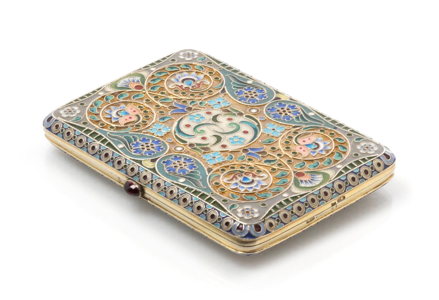 A Russian Enameled Silver Cigarette Case, Mark of I.P. Khlebinikov with Imperial Warrant, Moscow, 19th century, the case having a gilt