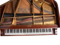 A Steinway and Sons Mahogany Baby Grand Piano