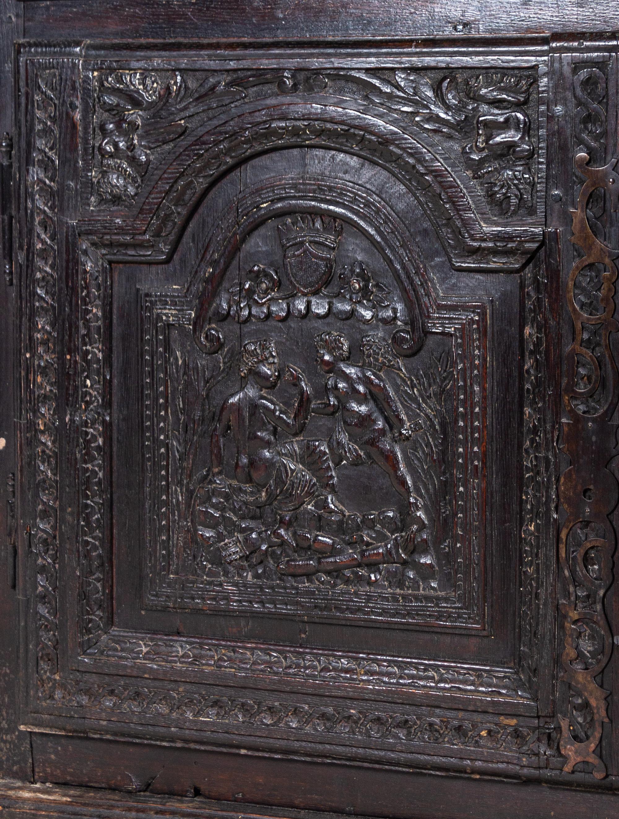 A Renaissance Style Carved Walnut Cabinet