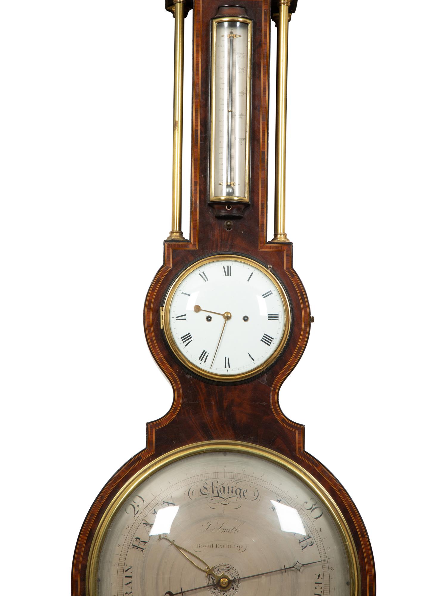 A Regency Crossbanded Mahogany Repeating Clock and Barometer
